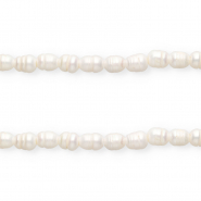 Imperfecte zoetwaterparels rice 11x9mm Natural white