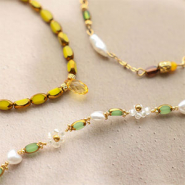 Nieuw Prachtige nieuwe ovale glaskralen met gouden rand