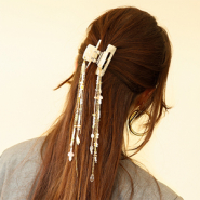Inspiratiesets Tips voor het stylen met haarclips