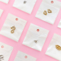 Minimalistische sieraden met rvs bedels met strass 